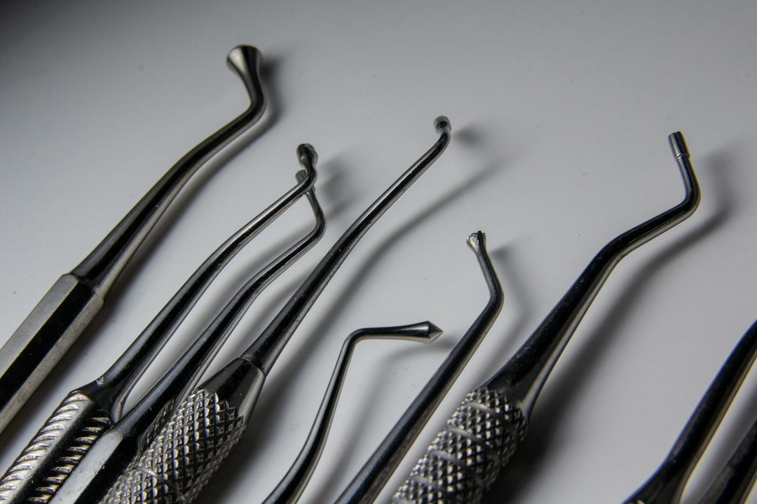 a-group-of-dental-tools-sitting-on-top-of-a-table-t3z9mibv-ky