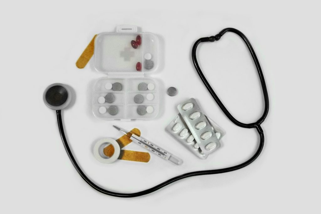stethoscope-and-medical-supplies-on-white-s1v7hvuicg0